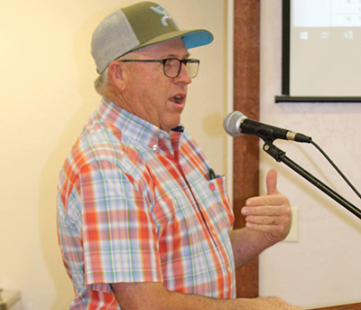 Photo by Toni GibbonsTaylor resident Lonnie Sherwood addressed the Taylor Town Council regarding the issues the new walking path is creating with the water ditch in front of his yard. Mayor David Smith directed Town Manager Gus Lundberg to look into the matter.