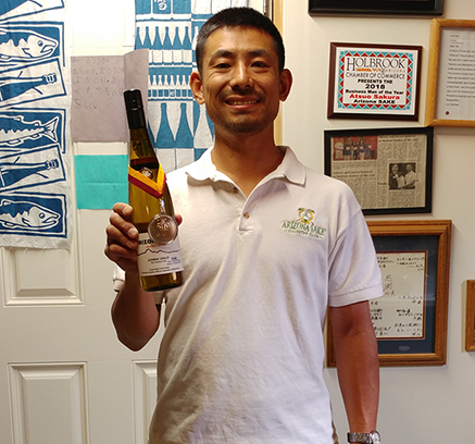 Photo courtesy of Atsuo SakuraiAtsuo Sakurai, owner of Arizona Sake Company, displays the gold medal won for “Best of Class” from the 2019 Los Angeles Wine Competition for his sake brewed in Holbrook.