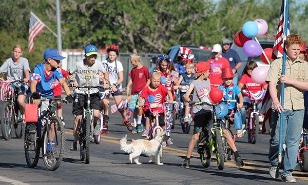 Photos by Linda KorIt doesn’t get more American than this as a group of kids led the way in the parade with their decorated bikes, and even a Boy Scout carrying a flag.