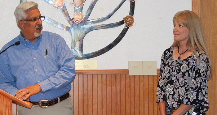 Photo by Toni GibbonsNavajo County Fair Board President Michael Sample (left) introduced Michelle Stock (right), the new fair manager and event director for the fairgrounds, to the Board of Supervisors.
