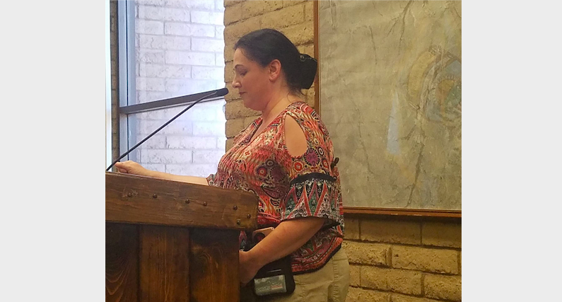 Olivia Todd, a former City of Winslow budget analyst, addressed the Winslow City Council on the topic of her termination in May.