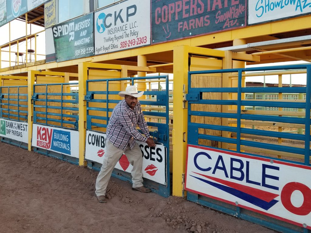 Photo by China CassidyThe county fair is nearly here! Navajo County Fairgrounds Maintenance Manager Jose Villareal fastens the signs inside the rodeo arena in preparation for the Navajo County Fair that is set to begin next Wednesday, Sept. 11.