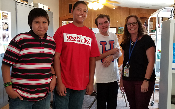 Photo by China CassidyMembers of Holbrook High School’s Life and Job Skills class joined the workshop. Pictured here are (left to right) Eric Clark, Leshon Attakai, James Greico-Harper and teacher Carey Kester.