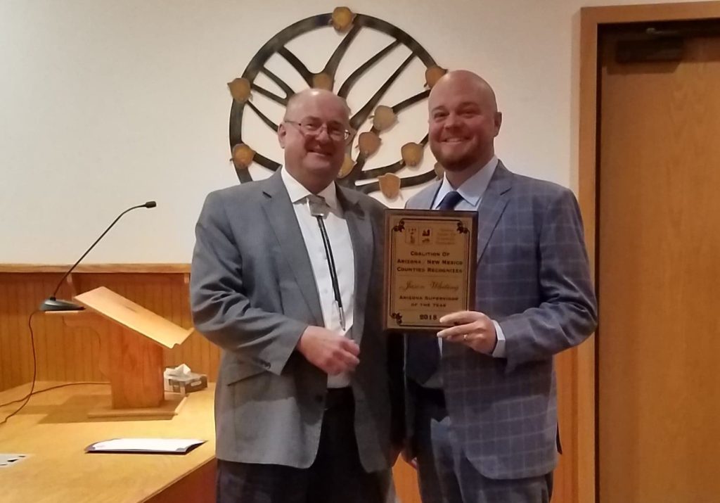 Photo by L. ParsonsDistrict III Supervisor Jason Whiting (right) received a plaque from Douglas Decker (left) of the Arizona/New Mexico Coalition.