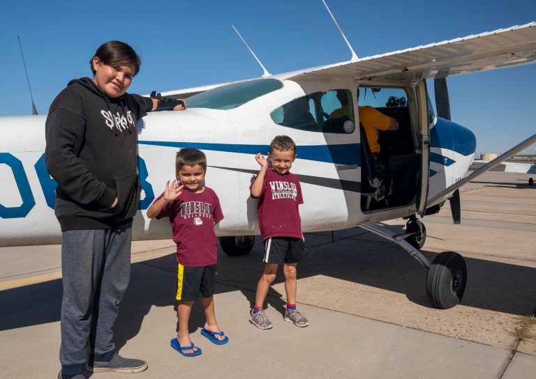 Photo by Jim BuckleyJames Russell (left), and his little buddies Conrad (center) and Robert (right) Leonard were excited to take a plane ride around Winslow.