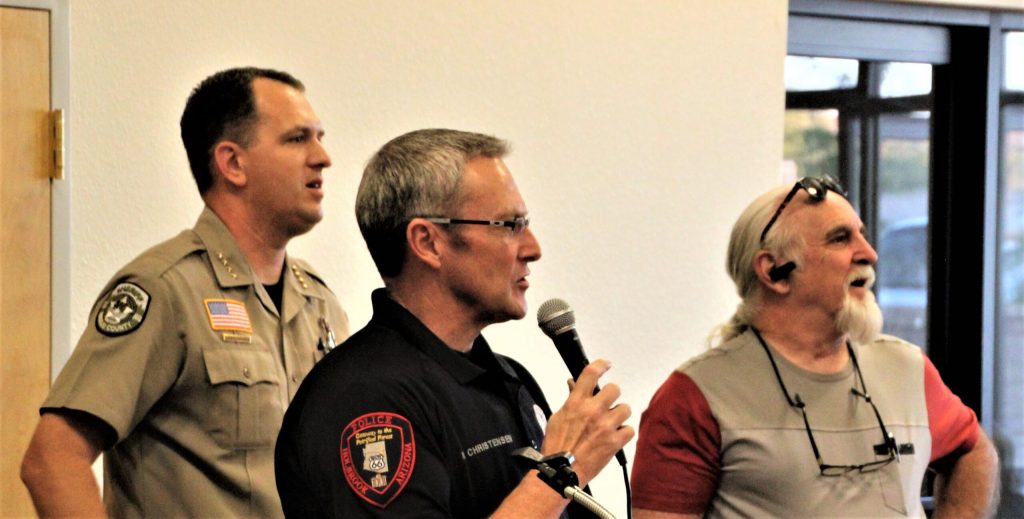Photo courtesy of the Bread of Life MissionLaw enforcement officers with the Holbrook Police Department and Navajo County Sheriff’s Office gave generously both of their time and money at the Bread of Life Mission banquet. Pictured here are (left to right) Sheriff David Clouse, HPD Chief Nathan Christensen and Eric Luhmann who assisted with the sound system for the event.