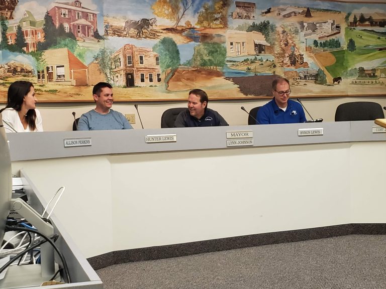 Photo by Amanda NicholsSnowflake council members (left to right) Allison Perkins, Hunter Lewis, Mayor Lynn Johnson, and Councilman Byron Lewis were in great spirits as the town council meeting came to a quick close last week.