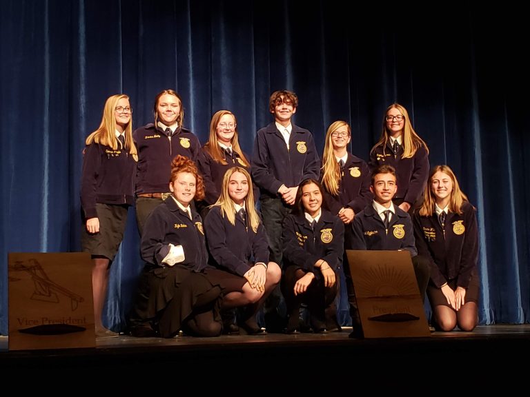 Photo by Amanda NicholsFFA members including (front row, left to right) Greenhand Officers Calla Tatman, Amelya Marsh, Selena Campos, Kelton Chairez, Chapter Officer Elexis White (back row) Chapter Officers Savanna White, Kristen Newby, Jade McNeil, Caleb Vowell, Hunter Germain and Elizabeth Moses welcome first year agriculture students who received their degrees.