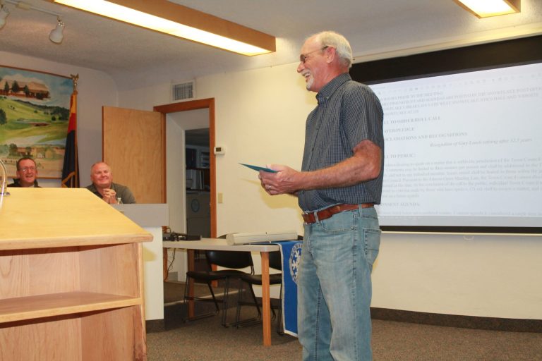 Photo by Amanda NicholsWastewater Plant Operator Gary Leach receives glowing praise from coworkers and the council as he announces his retirement from his services with the Town of Snowflake