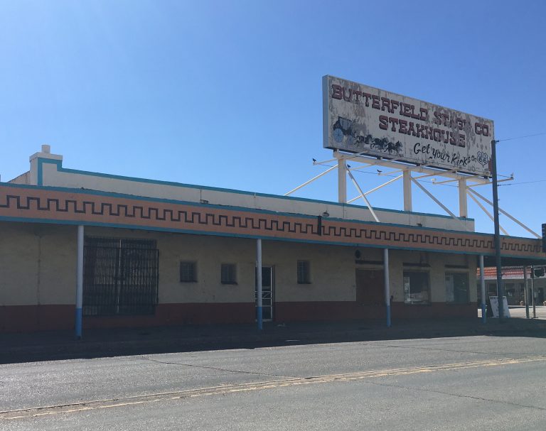 Photos by Linda KorThe old bus depot (left) located on the corner of Hopi Drive and Navajo Blvd. is situated on a prime lot along Route 66. The building has long been deteriorating with a blighted sign on top of it that is also in violation of city code. The interior of the structure (right) is filled with debris, water damage and has a large open basement opening in the floor all visible through exterior broken and uncovered windows and doors.