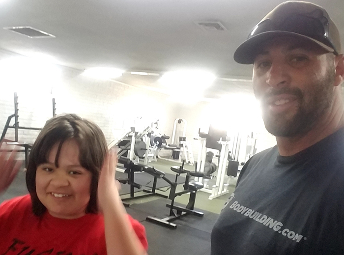 Photo courtesy of Pat SernaJennifer Serna, 14 (right) enjoys visiting the gym with her dad Pat Serna (left) where they often spend quality time together.