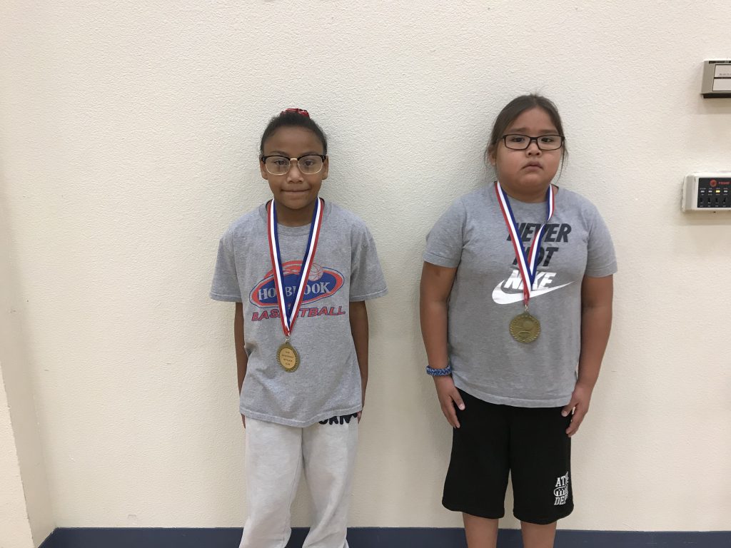 Photos courtesy of Elks Lodge No. 2450The winner in the 8-9 year old boys’ division was Jayden Yazzie (right) who made 13 out of 25 shots. The winner in the 8-9 year old girls’ division was Clara Irving (left), who made three out of 25 shots.