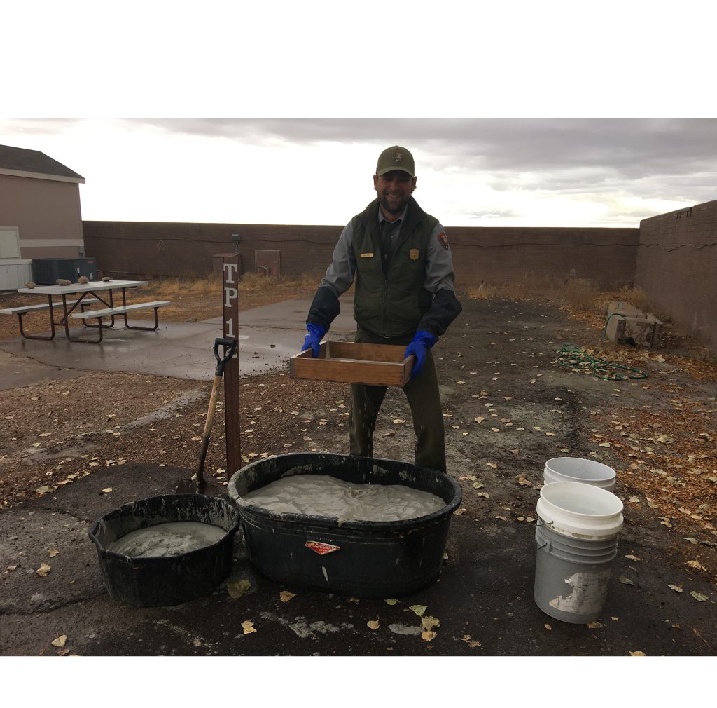 Photo courtesy of Sarah HervePetrified Forest National Park Paleontologist Adam Marsh (pictured) demonstrates how the mudstone that contains the rock is melted down in the water then put through a series of screens to remove the silt that surrounds the bones leaving them with coprolites, sand and bones.