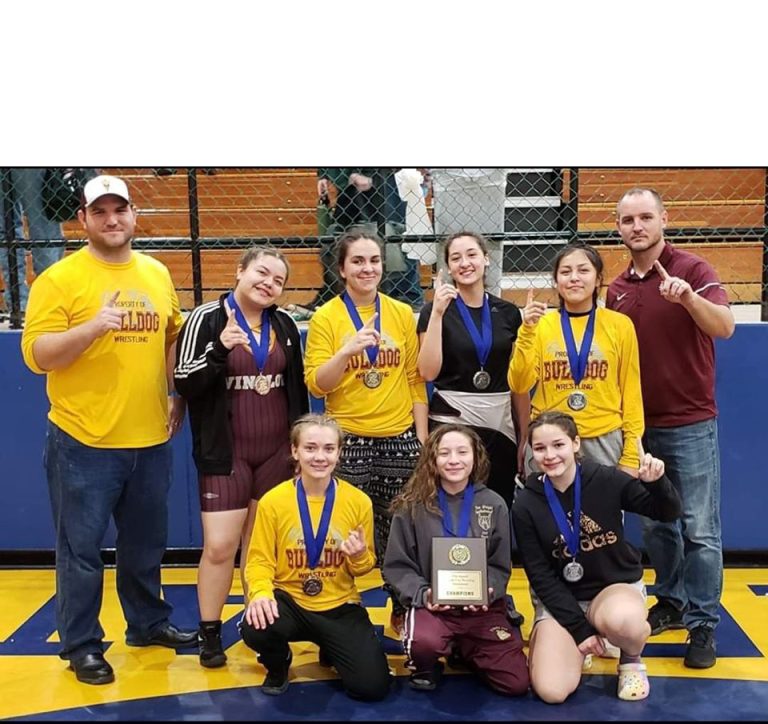 Photo courtesy of Winslow High SchoolThe Winslow High School lady wrestlers were the champions of WHS’s first girls tournament. Lady Bulldog wrestlers include (front row, left to right): Rory Lassiter, Alyssa Cordova, Madison Estrada (back row) Coach Joseph Larsen, Charry Benecke, Nova Ragnoli, Elyna Lopez, Riley Davila and Coach Scott Larsen.