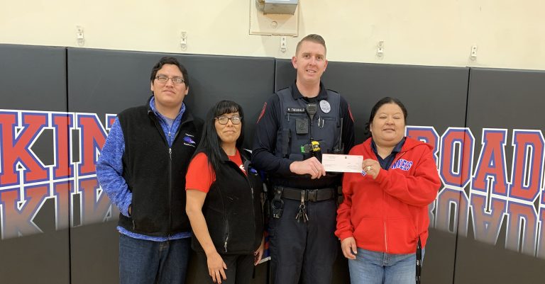 Photo courtesy of Holbrook Police Department The Holbrook Police Department was the recipient of a donation in the amount of $15,000 from the Tiisyaakin Residential Hall in Holbrook. Pictured are (left to right) recreational technician Maurice Joe, receptionist Laverne Joe, HPD Officer Matthew Theobald and Executive Director Renee White-Alcott.