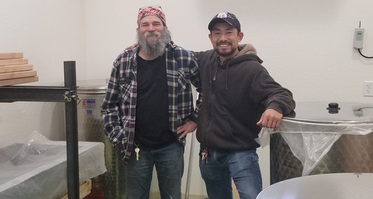 Photo by China CassidyAtsuo Sakurai (right) and his employee Steve Peck (left) are all smiles while talking about the process of creating the world-renowned Arizona Sake.