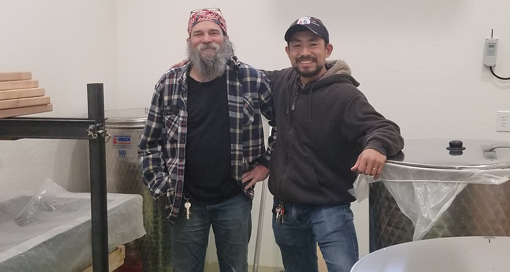 Photo by China CassidyAtsuo Sakurai (right) and his employee Steve Peck (left) are all smiles while talking about the process of creating the world-renowned Arizona Sake.