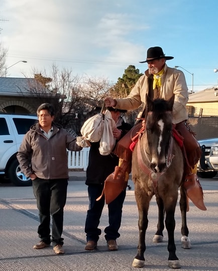 Photos by Linda StofferRiders of the Hashknife Pony Express rode their 62nd ride on Feb. 5, making the annual relay-style horse and rider trek to Scottsdale to deliver the mail. Starting off this year’s event was rider Walter Pacheco (right) pictured with Holbrook Post Office Officer in Charge Melanie Greymountain (left) and Captain Mark Reynolds (center).