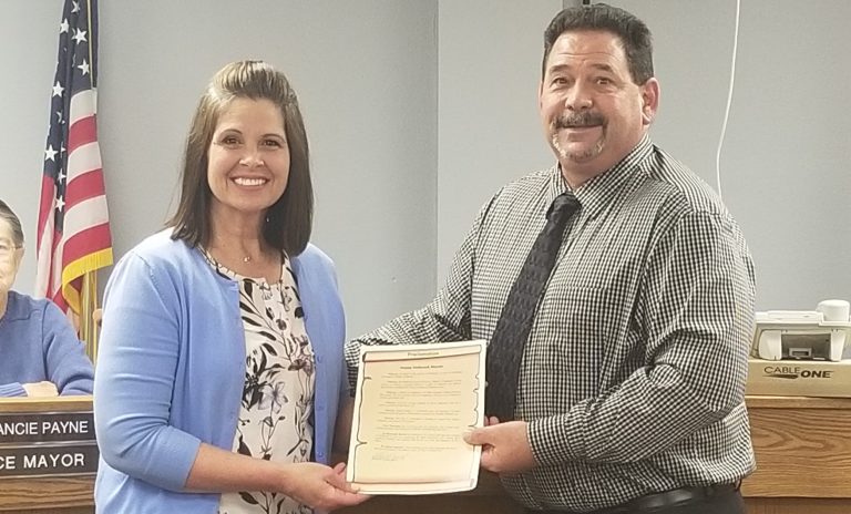 Photo by China CassidyMayor Merrill Young (right) read the proclamation presented by Holbrook Foundation member Debbie Shumway (left) declaring April Happy Holbrook Month.