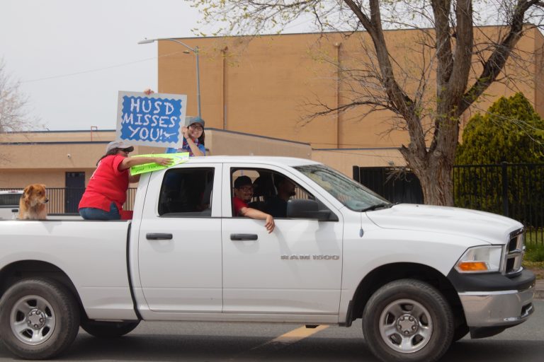 Photos by China CassidyTeachers got on board as (left to right) fourth grade teacher Jessica Paz, special education teacher Saraphania Benally, Victor Paz of the HUSD maintenance department and Hunter Byron joined several other teachers and personnel for a parade around the town to say hello to the students.