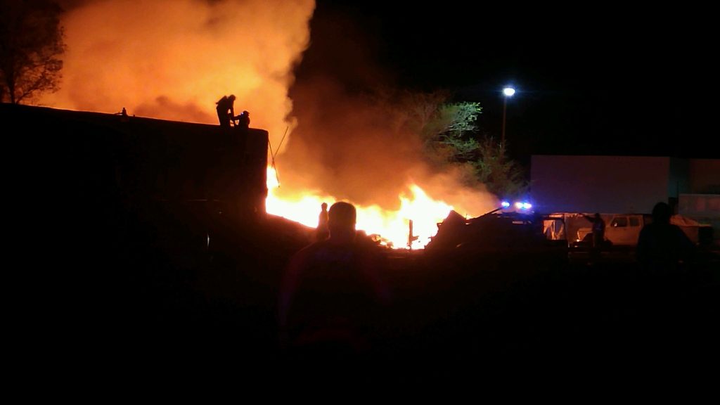 Photo by Tom SladeA small warehouse in Holbrook was leveled by fire last week. The cause of the fire remains under investigation.