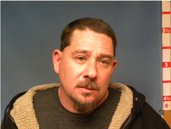 Photo courtesy of Holbrook Police DepartmentAaron Thomas (left) was arrested in connection with damage to the Nakai Indian Art building (right) in Holbrook.
