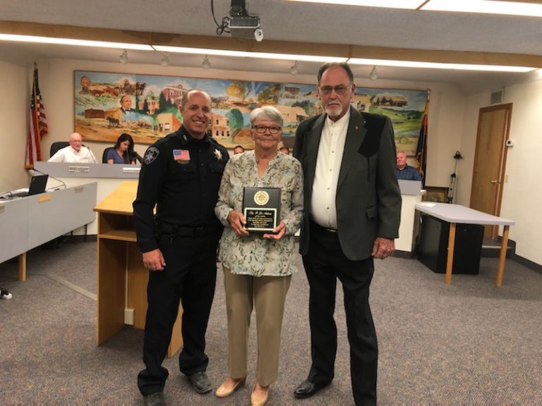 Photo courtesy of Snowflake/Taylor Police DepartmentThe Town of Snowflake honored two individuals who have logged over 6,000 volunteer hours at the Snowflake/Taylor Police Department in the STPD VIP and STFD CERT programs over the past 11 years. Don (right) and Jeri (center) Anderson have been instrumental in the operation of STPD through their volunteer efforts. Also pictured is Police Chief Bobby Martin (left).