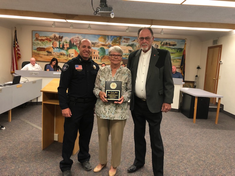 Photo courtesy of Snowflake/Taylor Police DepartmentThe Town of Snowflake honored two individuals who have logged over 6,000 volunteer hours at the Snowflake/Taylor Police Department in the STPD VIP and STFD CERT programs over the past 11 years. Don (right) and Jeri (center) Anderson have been instrumental in the operation of STPD through their volunteer efforts. Also pictured is Police Chief Bobby Martin (left).