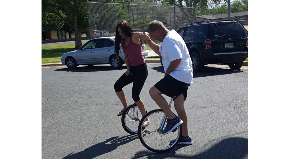 Photo by Shar GillespieIt was a day of fun for Holbrook resident John Guttery (right) and his daughter Haley Guttery (left) as they spent time unicycling around the city.