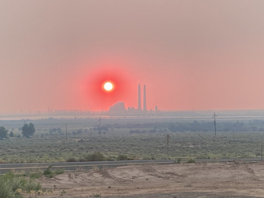 Photo by Josh KorThe fire raging in Tonto National Forest brought smoke and ash to the region last week as seen in this undoctored sunset photo taken of Cholla Power Plant in Joseph City. Many residents awoke the following day to their home and vehicles covered in a layer of ash.
