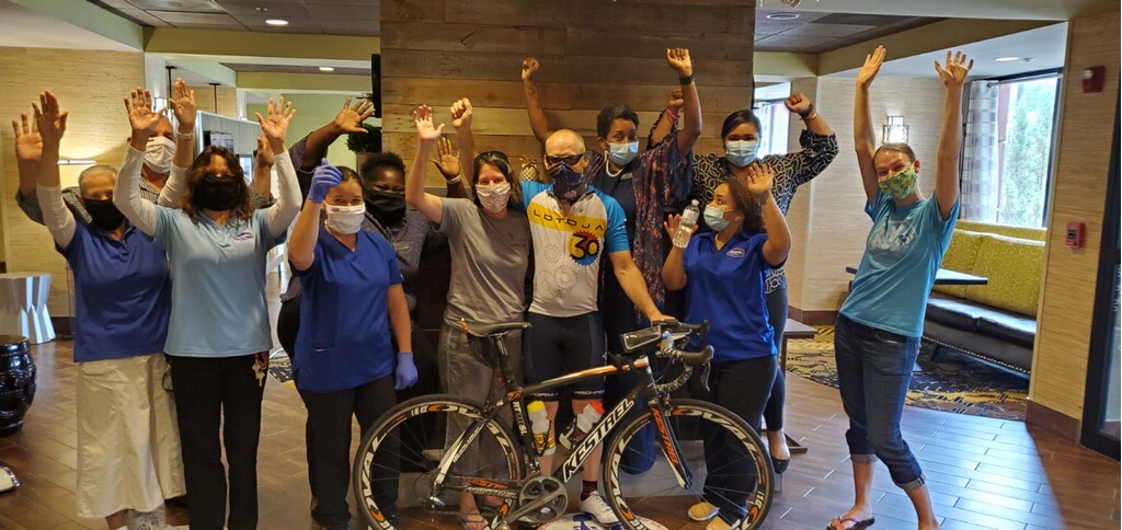 Nelson Palmer (center) and his family received a warm welcome from the staff at the Hampton Inn in Carrollton, Ga., on June 10.