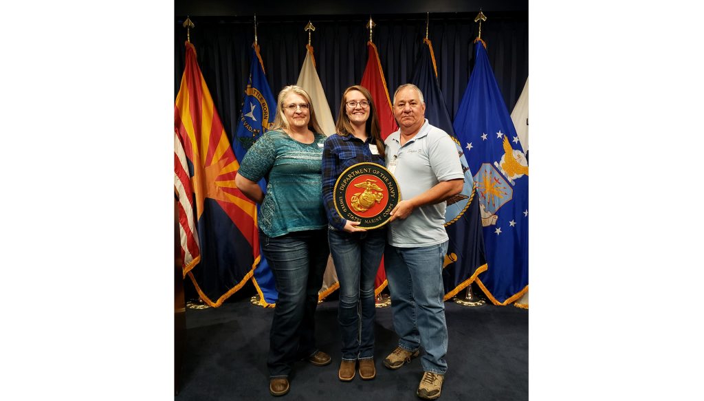 Photo courtesy of the McCormick familyBreeAnna McCormick (center) is pictured here with her proud parents Rachel and Ken McCormick after being sworn into the Marine’s delayed entry program.