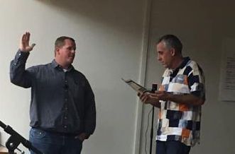 Photo courtesy of the Joseph City Unified School DistrictThe Joseph City Unified School District Governing Board President Karsten Flake (right) swore in new board member Andrew Bushman (left) during its meeting last week.