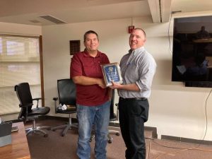 Photo courtesy of Joseph City High SchoolLast week Joseph City High School honored Eldon Larsen (left) for his service of 25 years as a coach at the school. Presenting the award is JCHS Principal Eric Miller (right). Larsen also is a long-time member of the Joseph City Unified School District Governing Board.
