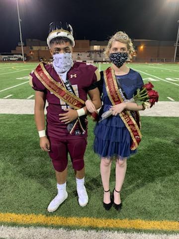 Photo by Nicole GuzmanWinslow High School crowned Homecoming King Noah Leonard (left) and Queen Kendall Kavlicek (right) at last Friday’s homecoming football game where precautions were taken to ensure the safety of students and attendees.