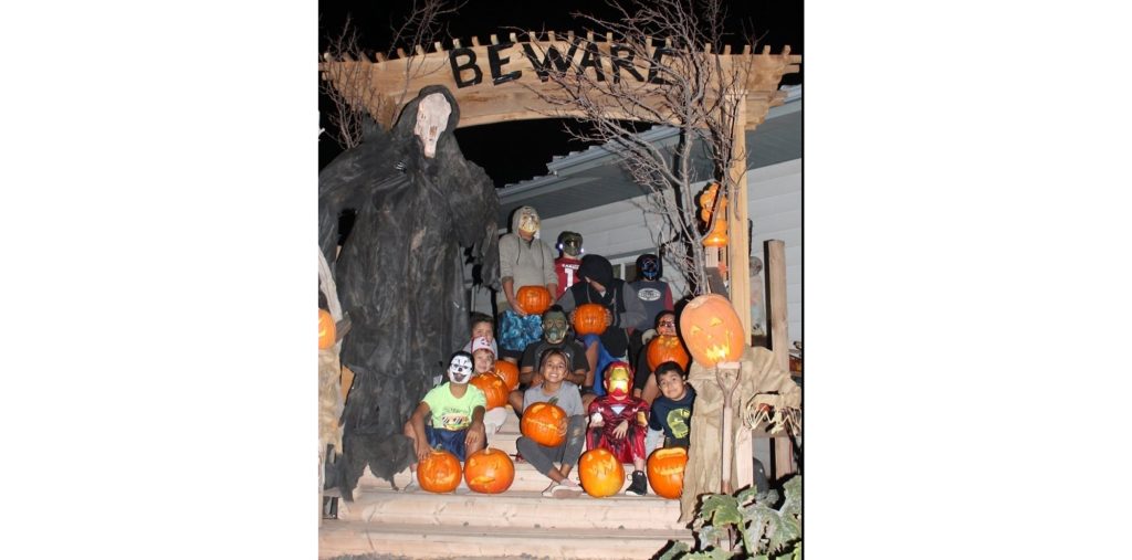 Photo by China CassidyJust in time for the Holidays, the Autobee family of Holbrook finished their front deck arch and wasted no time getting it ready for Halloween. To celebrate the upcoming holiday, Cyndi Curtis and Jordan Autobee hosted a pumpkin carving party for their kids and some of their friends. Pictured are (front row, left to right) Caitlyn Curtis, Hayden Yellowhair, Patrick Cassidy, Truen Autobee, (middle row) Jasmine Jordan, Junior Sample, Levi Autobee, Renee Curtis, (back row) Dhimitrio Scott, William Cassidy, Ladanian Scott and Byson Autobee.