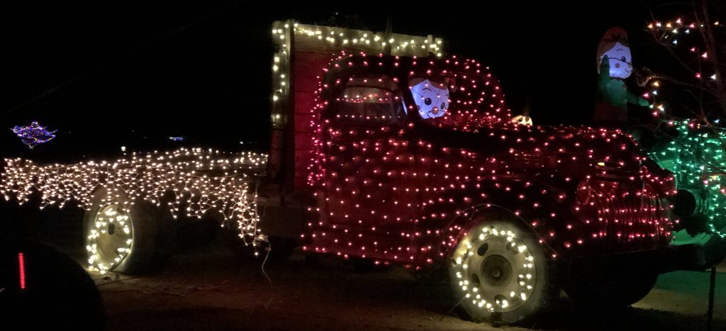 Photos by Linda KorThe Westover property is lit with holiday surprises including this truck driven by a happy snowman.