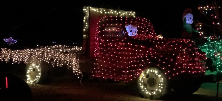 Photos by Linda KorThe Westover property is lit with holiday surprises including this truck driven by a happy snowman.