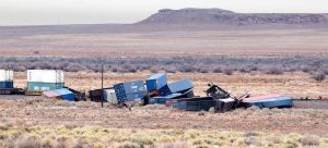 Photo by Jim BuckleyAt least 16 20-foot intermodal containers were derailed from the BNSF railroad line east of Winslow on Sunday. The cause of the derailment is currently under investigation.