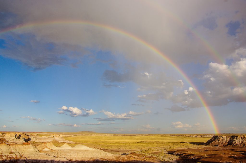 Photo by Stuart Holmes/National Park ServiceFor those looking to get outdoors, the beauty of the Petrified Forest and Painted Desert is just a short trip away and is open for enjoyment and some healthy exercise. This photo is of a rainbow over Blue Mesa, one of the scenic drives and hikes available at the Petrified Forest.