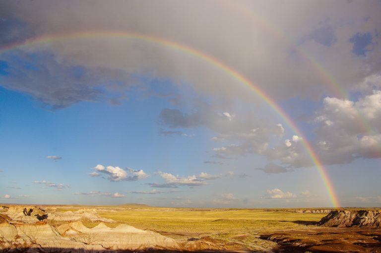 Photo by Stuart Holmes/National Park ServiceFor those looking to get outdoors, the beauty of the Petrified Forest and Painted Desert is just a short trip away and is open for enjoyment and some healthy exercise. This photo is of a rainbow over Blue Mesa, one of the scenic drives and hikes available at the Petrified Forest.