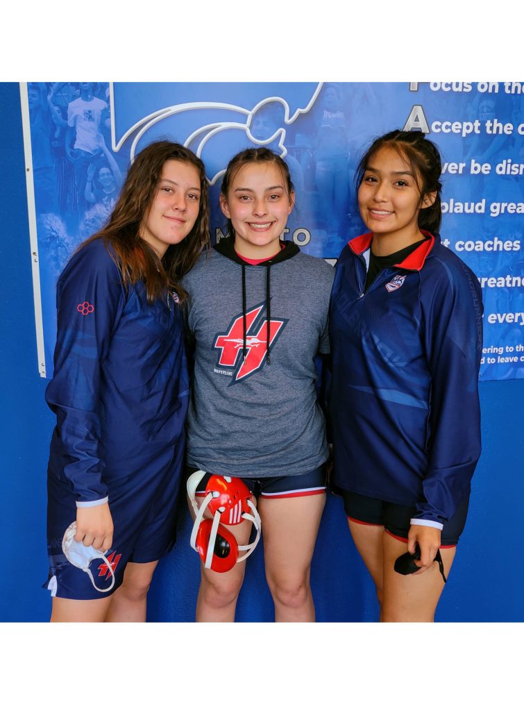 Photo courtesy of Holbrook High SchoolHolbrook High School wrestlers (left to right) junior Samara Kennedy, sophomore Sierra Aho and senior Sharadee Sands are the first female wrestlers from HHS to go to state. Sierra Aho and Samara Kennedy both ended the tournament placing 6th.