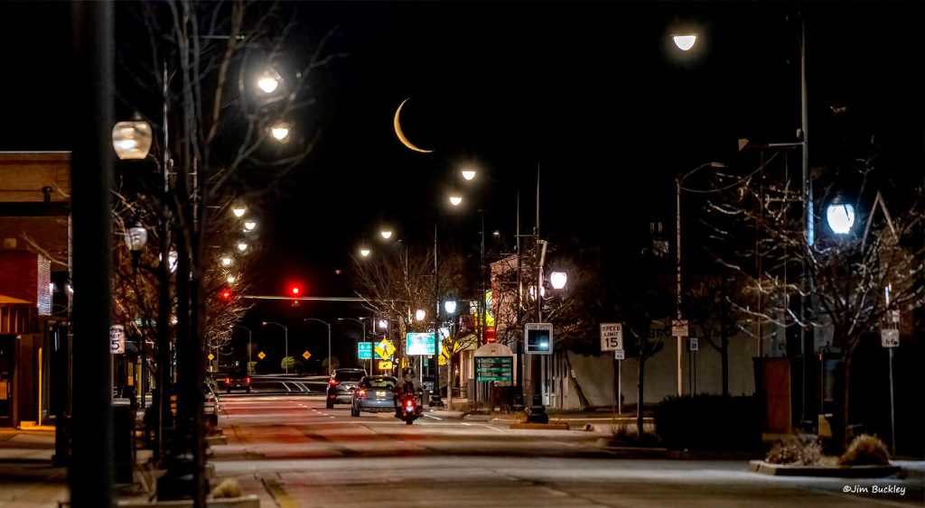 Photo by Jim BuckleyEarly commuters in downtown Winslow had a clear sky and beautiful sliver of the Moon to guide the way last Sunday. Although there will be some patchy clouds this week, Friday is set to be about perfect with cloudless skies and temperatures reaching the mid-70s.