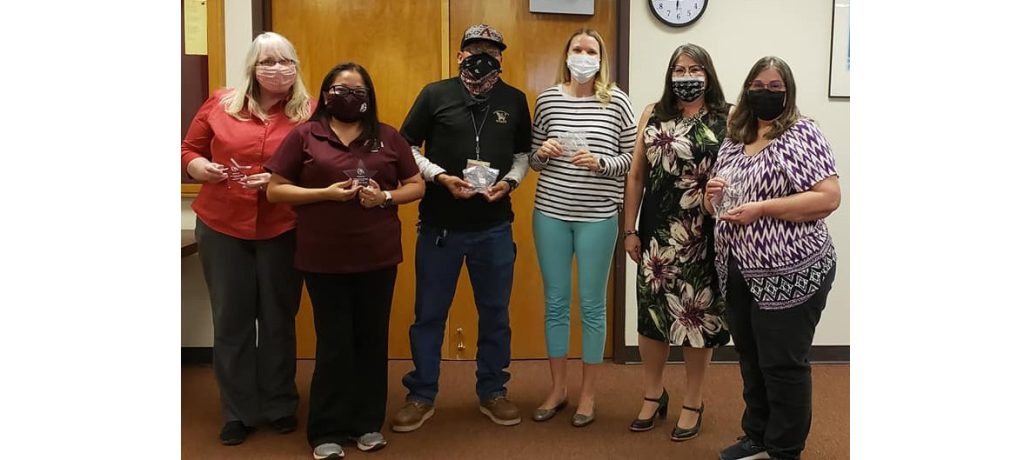 Photo courtesy Winslow Unified School DistrictThe Winslow Unified School District Governing Board and acting Superintendent Connie Gover (fifth from left) recognized (left to right) Charlene Gile, Michelle Jones, Benny Yazzie, Larisa Richards and Linda Guerrero.
