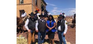 Photos by Linda KorCoral Evans (second from the right), the regional director for Northern Arizona for Senator Mark Kelly, was on hand for the swearing in of the Hashknife Posse at the Historic Navajo County Courthouse for the annual Pony Express Ride. Also pictured are posse members (left to right) Steve Reynolds, Captain Mark Reynolds and Pat Nichols.