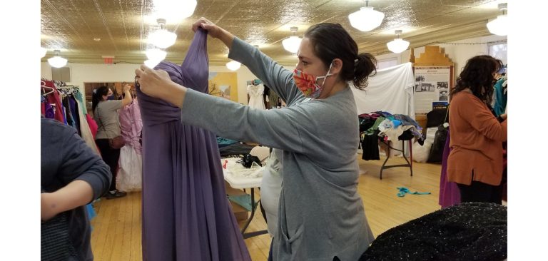 Photo by L. Parsons Winslow Mayor Roberta “Birdie” Cano (pictured) helped dozens of prom goers find the perfect outfit for the May 1 event at Winslow High School. The annual dress giveaway is a collaboration between the City of Winslow, the Soroptomists of Winslow and the Cherry Bombs. Dresses, shoes and accessories are given away at no cost to the students.