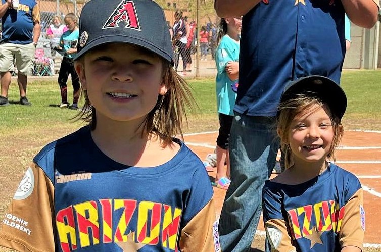 Photo by Clarissa WongThe faces of 6-year-old Riley Perez (left) and her 4-year-old sister Paisley (right) show just how much fun was being had at a festive opening day for Little League in Winslow last Saturday. This summer looks to bring many more smiling faces after the pandemic caused kids to go without so much last year.