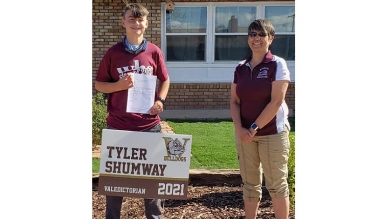 Photo courtesy of Winslow Junior High SchoolWinslow Junior High School Principal Deb Lopez (right) made a home visit to congratulate eighth grade Valedictorian Tyler Shumway (left) on his accomplishment.