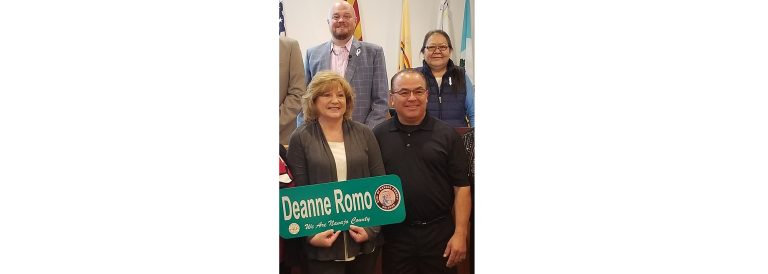 Photo by L. ParsonsNavajo County Clerk of the Superior Court Deanne Romo (front row, left) was recognized by the Board of Supervisors last week for her 40 years of service to the county. Romo was surrounded by her family, including her husband Thomas (right) and congratulated by Supervisors Jason Whiting (back row, left) and Fern Benally (right).