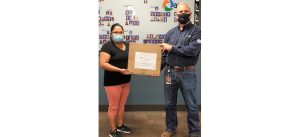Photo courtesy of Arizona Public ServiceLast week, Cholla Power Plant staff presented five laptops to each of the five area high schools courtesy of Arizona Public Service (APS). The computers will be raffled off to students during their drug and alcohol-free graduation parties. Cholla plant manager, Rick Nicosia (right) was honored to continue to be part of the APS tradition of providing graduates with tools that will help them to be successful in their futures. Audrey Leonard (left) of the Winslow High School Because We Care Committee received the laptops from Nicosia.